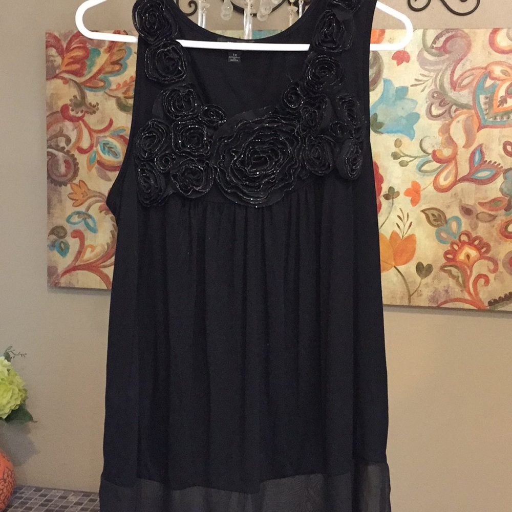 Sleeveless black blouse